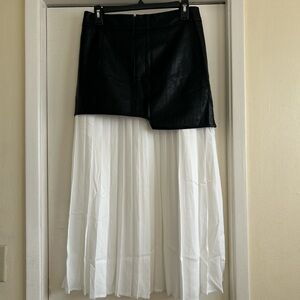 Commense Black Faux Leather Asymmetrical Miniskirt with White Pleated Overlay